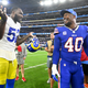 Buffalo Bills linebacker Von Miller (40), right, talks with Los Angeles Rams linebacker Terrell Lewis (52) after an NFL football game Sept. 8, 2022, in Inglewood, Calif.